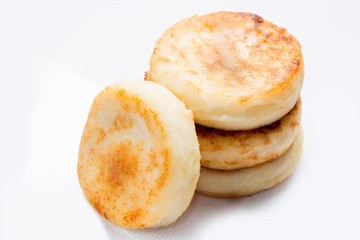 round cheesecakes on a white background