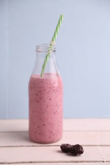 blackberry smoothie in color background