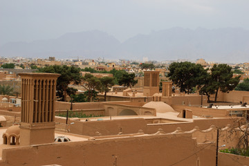 Yazd, Iran - May 14, 2017: the ancient city of Yazd built from clay with the first ancient air...