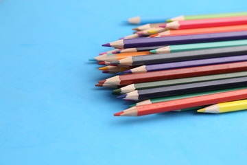 colored wooden pencils to draw