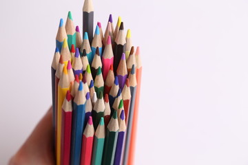 colored wooden pencils to draw