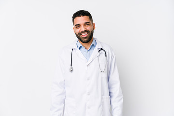 Fototapeta premium Young arabian doctor man isolated happy, smiling and cheerful.