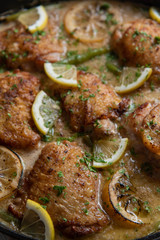 lemon butter chicken in iron skillet
