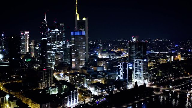 Aerial View Frankfurt skyscrapers financial district at night in 4k