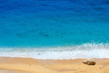 Waves and colorful Sands on the seafront