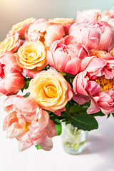 Fresh bunch of pink peonies and roses. Card Concept, pastel colors, close up image, copy space