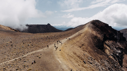 hikers walking top hill