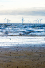 Wind turbines off the coast of Crosby beach North west England.