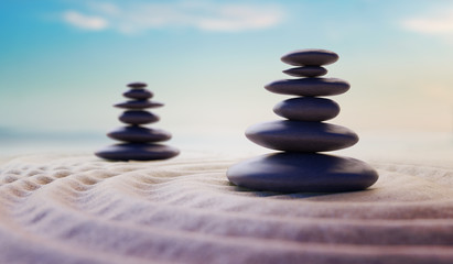 Fototapeta na wymiar Zen-like balanced stones in stack. Harmony and meditation concep