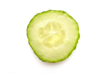 slice of greenhouse cucumber on a white background