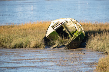 Fototapeta na wymiar old boat on the river