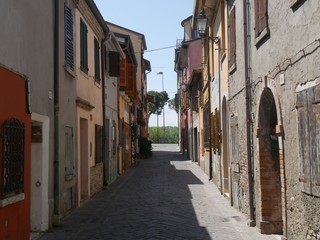 Borgo San Giuliano typical street with low and colorful houses