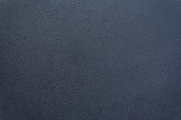 Grey solid metal background. Backdrop graphite color. Place for your text. copy space