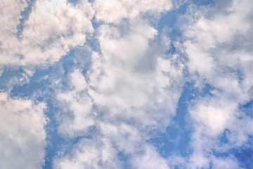 Blue sky with clouds. Beautiful sky background