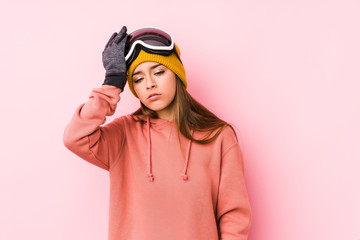 Young caucasian woman wearing a ski clothes isolated being shocked, she has remembered important meeting.