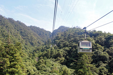 Miyajima, Japan - July 20, 2019: Miyajima Ropeway car in Hatsukaichi, Hiroshima which climbs Mount Misen of Miyajima Island. Cable car over mountain