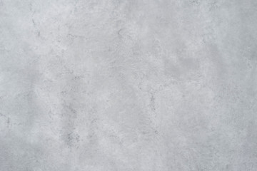 Texture of a smooth gray concrete wall as a background