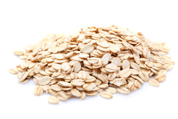 Heap of raw oatmeal on white background