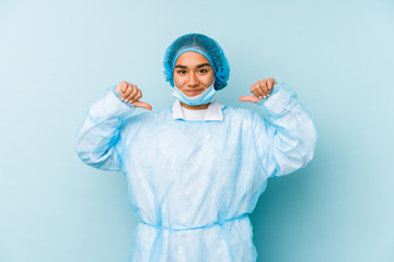 Young surgeon asian woman isolated feels proud and self confident, example to follow.