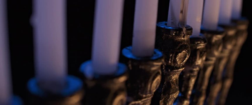 Close up of Hanukkah Menorah candles, jewish traditional holiday, slow motion, BMPCC 4K