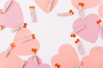 Beautiful greeting card design with a cosy bunch of overlapping warm and tender pink hearts...