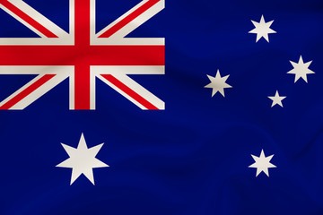 national flag of Australia on delicate silk with wind folds, travel concept, immigration, politics