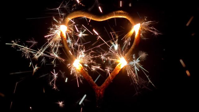Burning Fireworks Sparklers Heart Shaped In Dark Love Concept Slow Motion