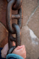 Kid Hand and Big Chain.