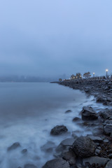 Hudson River coastline on a foggy sunset with long exposure