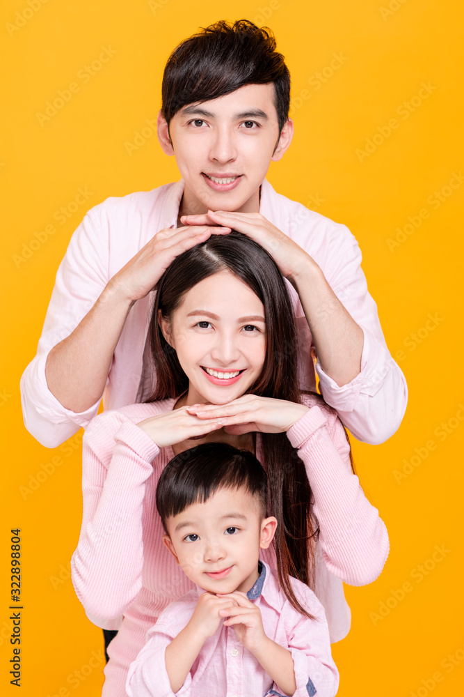 Wall mural closeup happy young family with pretty child