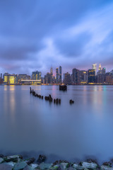 View on Midtown Manhattan from East River at sunrise with long exposure