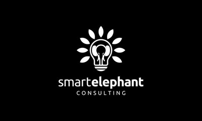 elephant with light bulb and eco leaf logo design concept