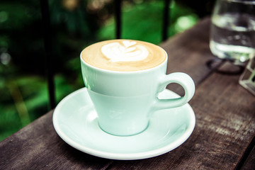 Coffee cup with outdoor background