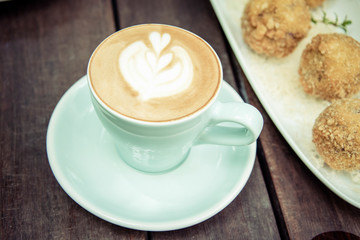 Coffee cup with outdoor background