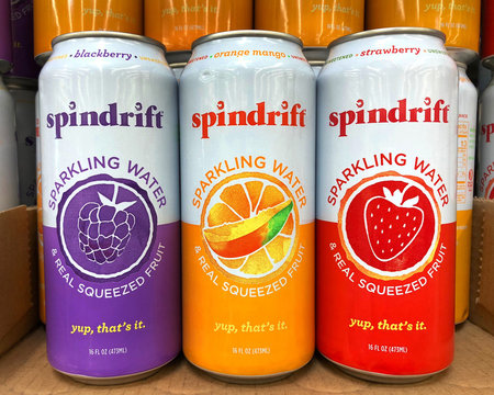 Irvine, CA - March 25, 2018: Grocery store shelf with cans of spindrift sparking water in various flavors. Each can contains delicious real fruit juice, only 10 calories and 1g of sugar per serving.