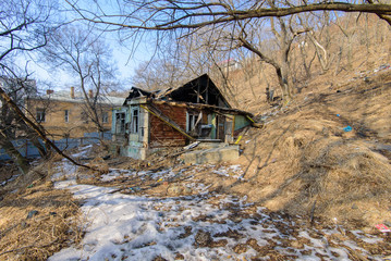 The burned-down abandoned barrack.