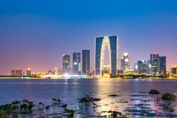 Naklejka premium Night view of architectural landscape in Jinji Lake Business District, Suzhou..