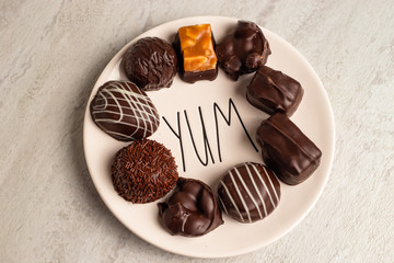 Dark chocolates on Yum plate
