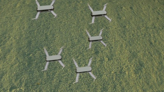 drones in air above ground