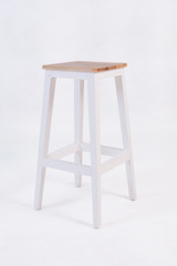 white cafe chairs and natural wood top with a white background