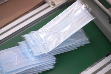 Automated equipment to speed up production of medical masks