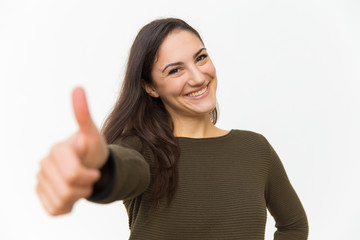 Beautiful smiling woman showing thumb up. Cheerful lady looking at camera and gesturing. Approving, ok concept