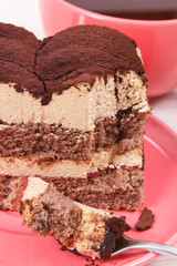 Tasty creamy tiramisu cake and black coffee for different occasions. Delicious dessert