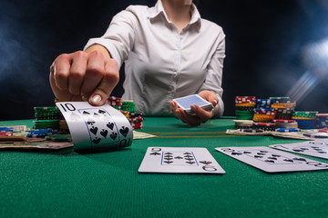 The croupier at the gaming table in the casino.