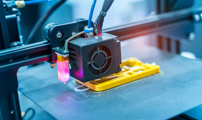 3D printer or additive manufacturing and robotic automation technology.
