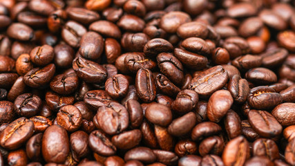 Many brown coffee beans, can be used as a background