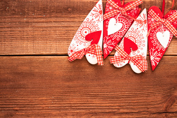 Valentine day post card: decorative wooden handmade crafted hearts. Top view