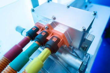 Battery and wire installed on electric system of eco car engine, Automotive part concept.