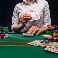 Poker game in a casino, online gaming business. Success and big winnings.