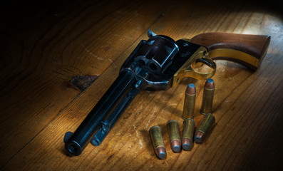 Wild West Revolver with Shells on table